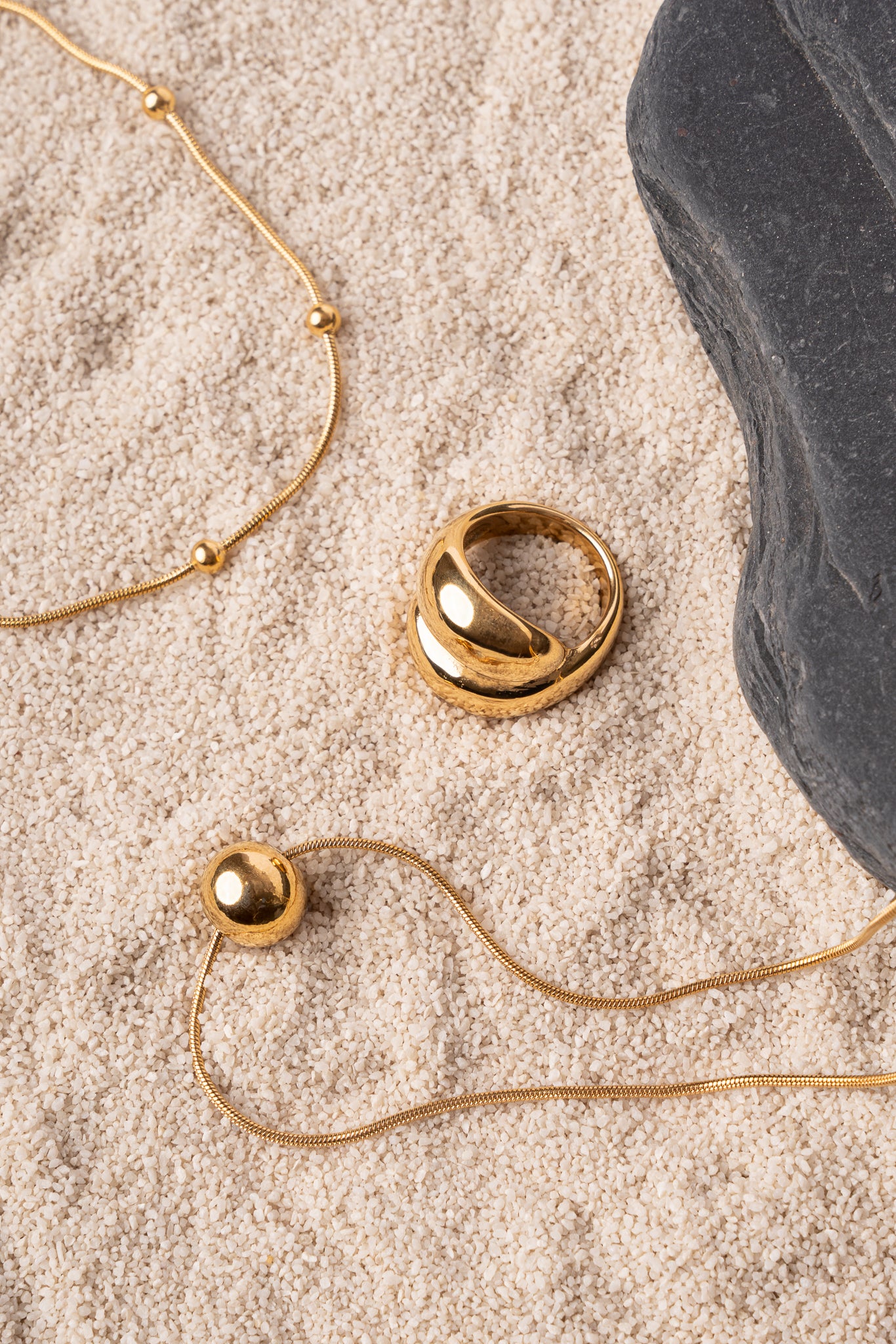 Collar bola espalda acero oro 18k mujer