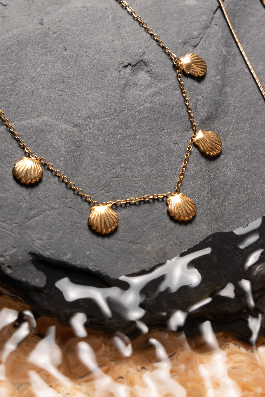 Tobillera conchas acero oro 18K mujer
