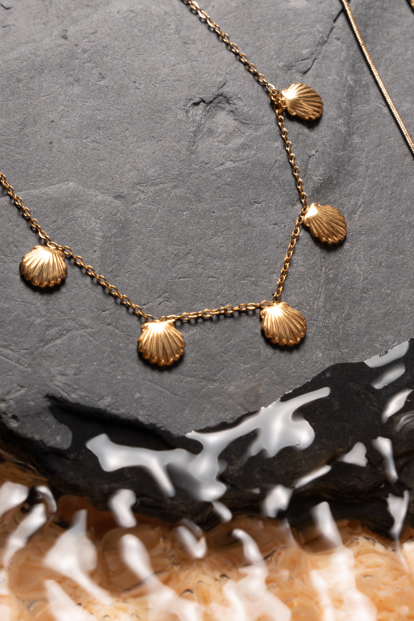 Tobillera conchas acero oro 18K mujer