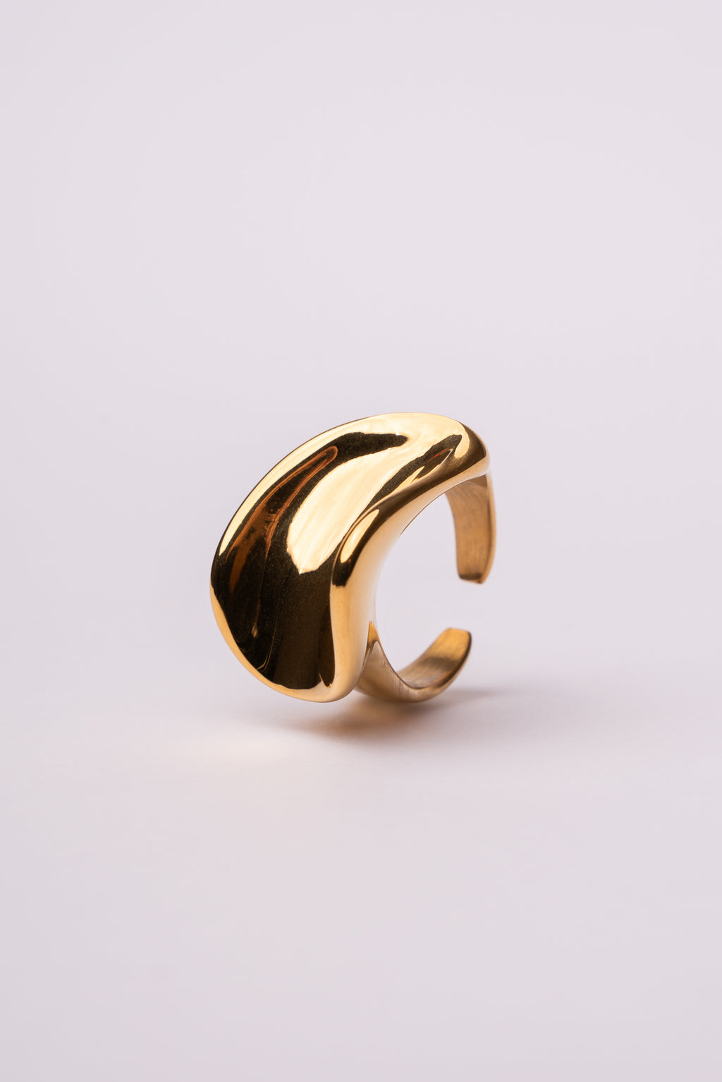 Anillo pieza irregular acero oro 18k mujer