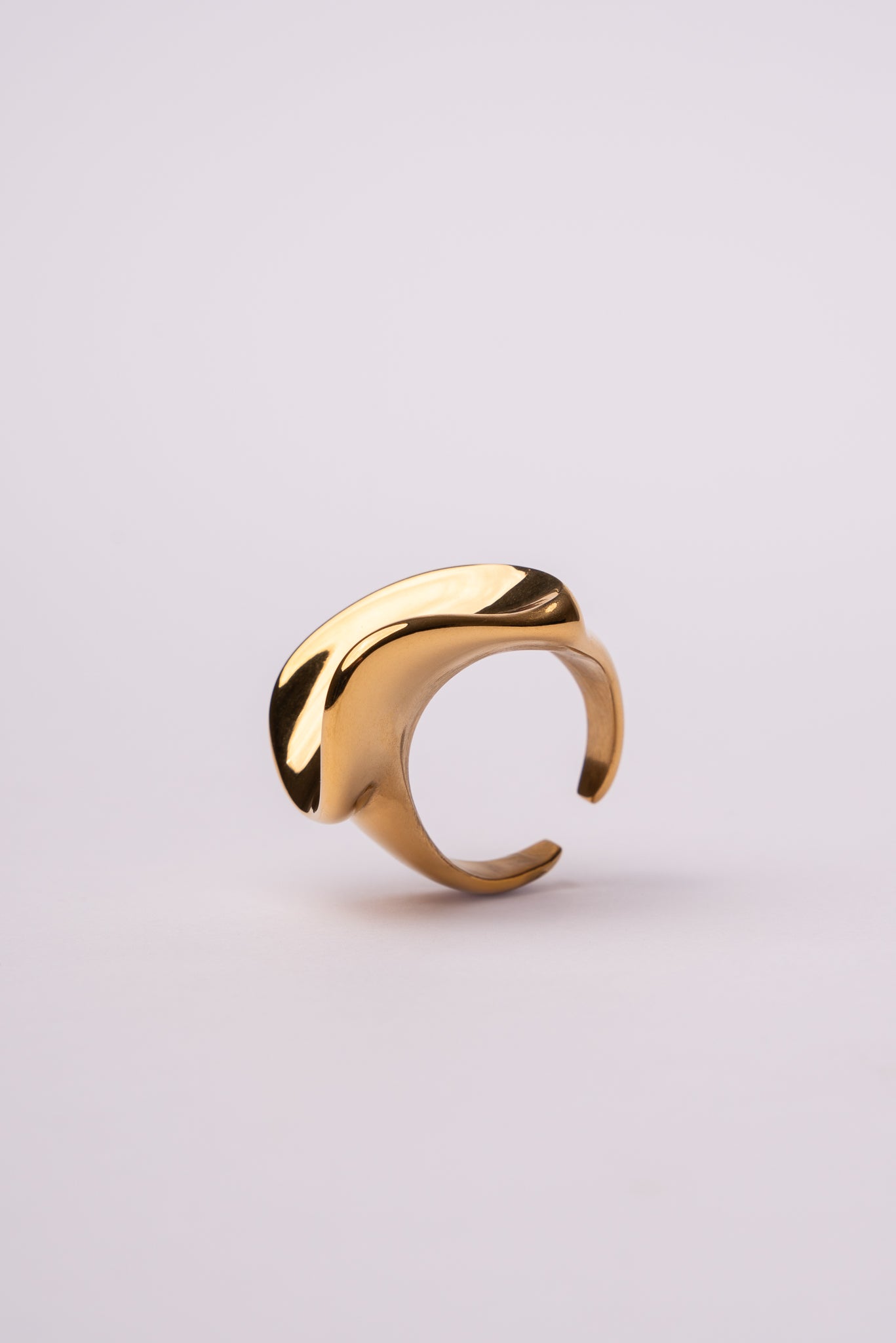 Anillo pieza irregular acero oro 18k mujer