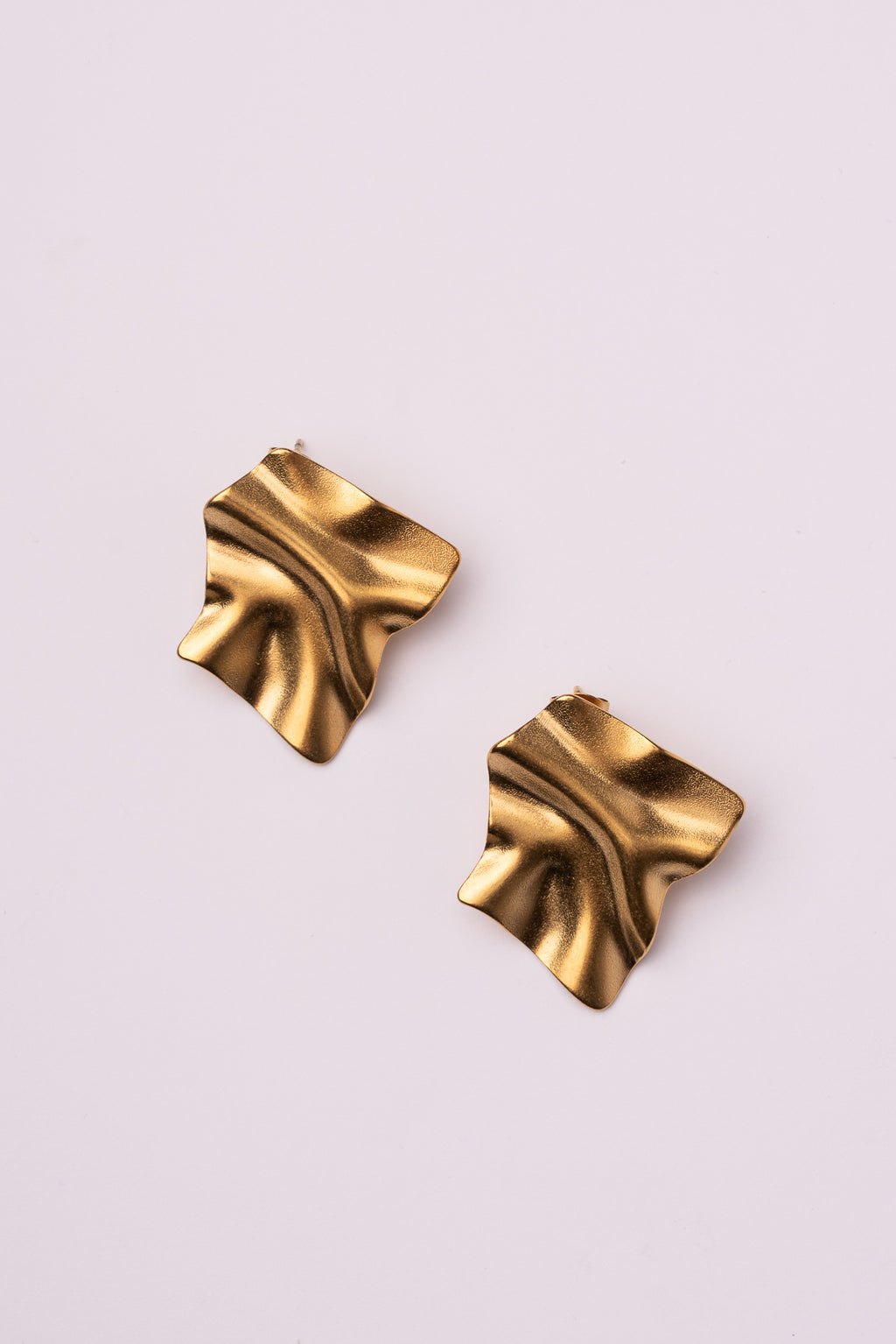 Pendiente forma abstracta acero oro 18k mujer