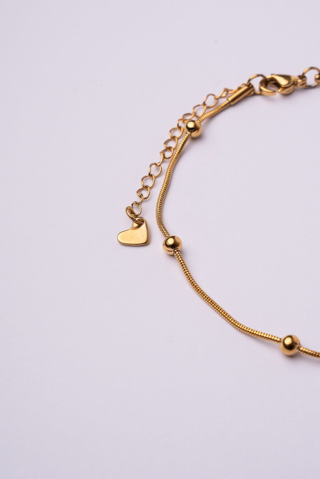 Tobillera bolas acero oro 18K mujer