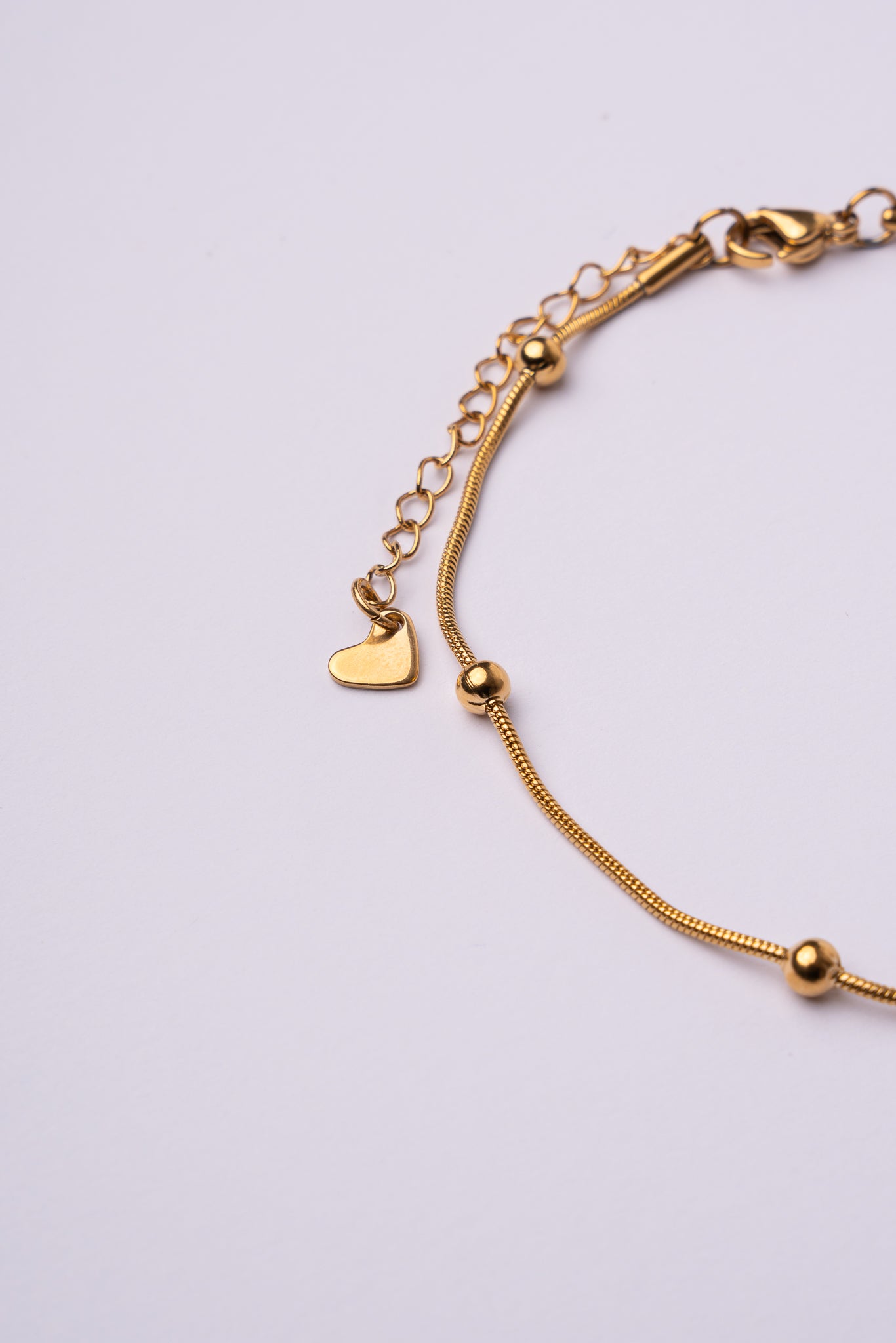 Tobillera bolas acero oro 18K mujer