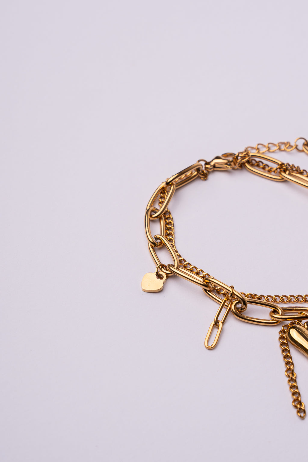 Pulsera doble cadena corazón acero oro 18k mujer