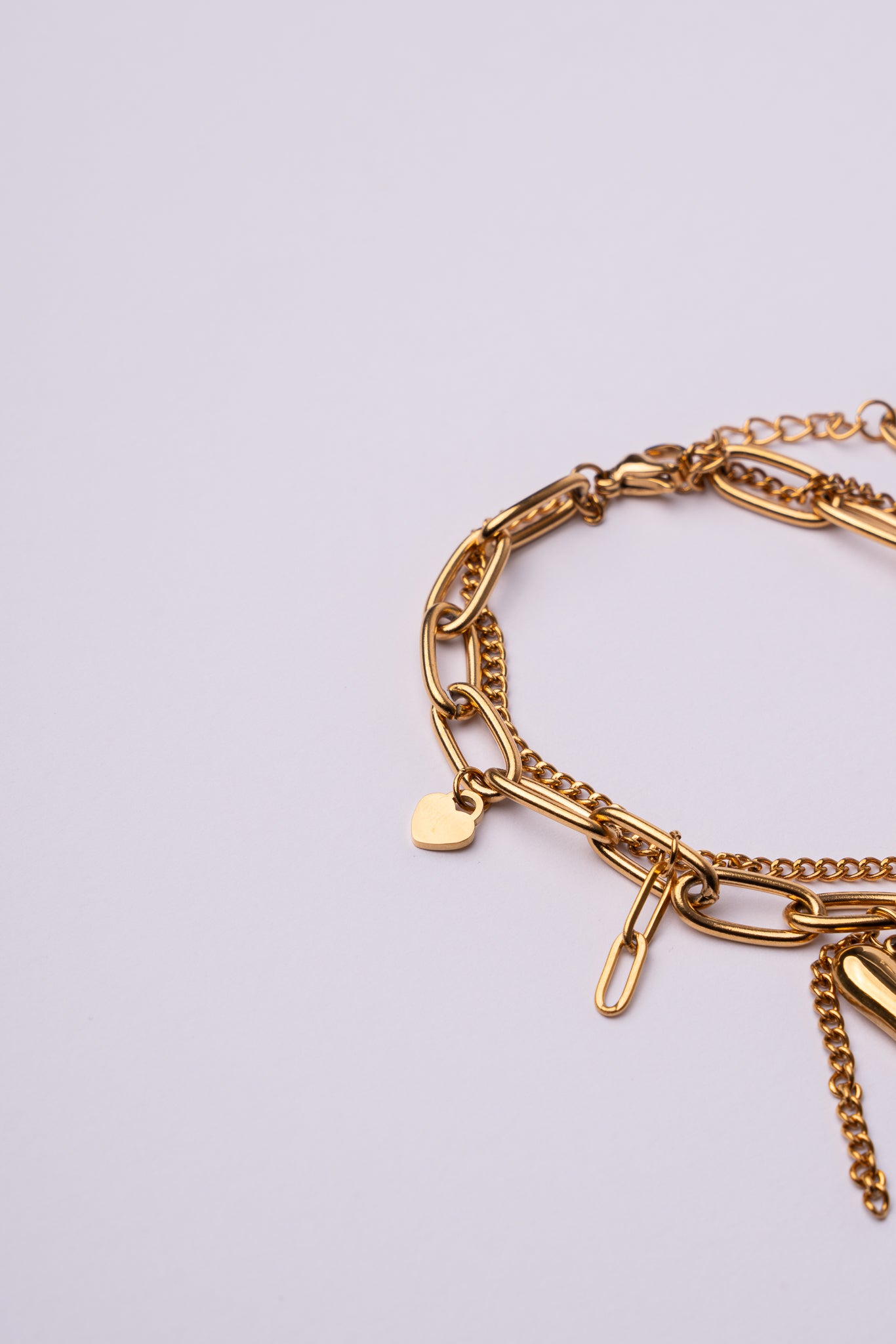 Pulsera doble cadena corazón acero oro 18k mujer