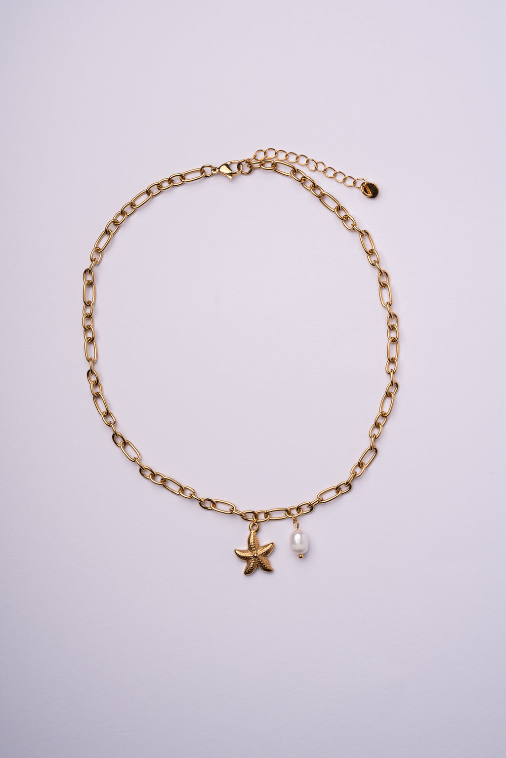 Collar estrella de mar acero oro 18k mujer
