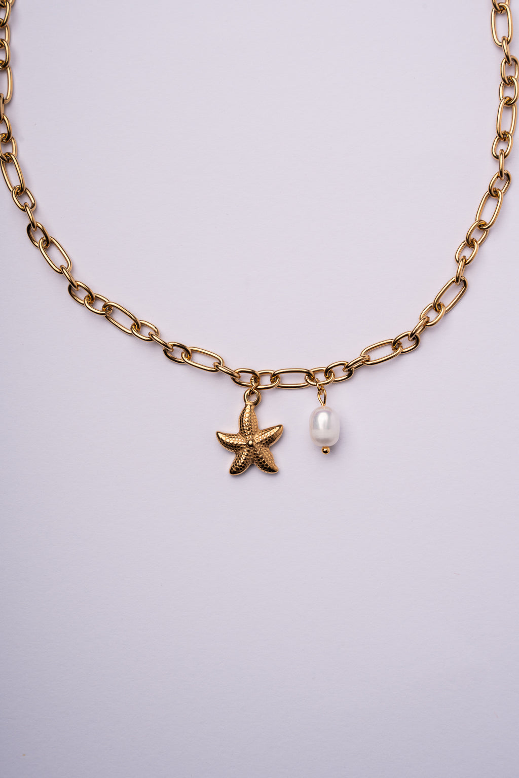 Collar estrella de mar acero oro 18k mujer