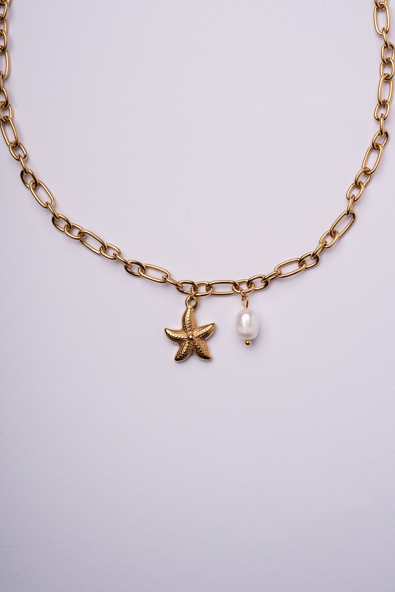 Collar estrella de mar acero oro 18k mujer