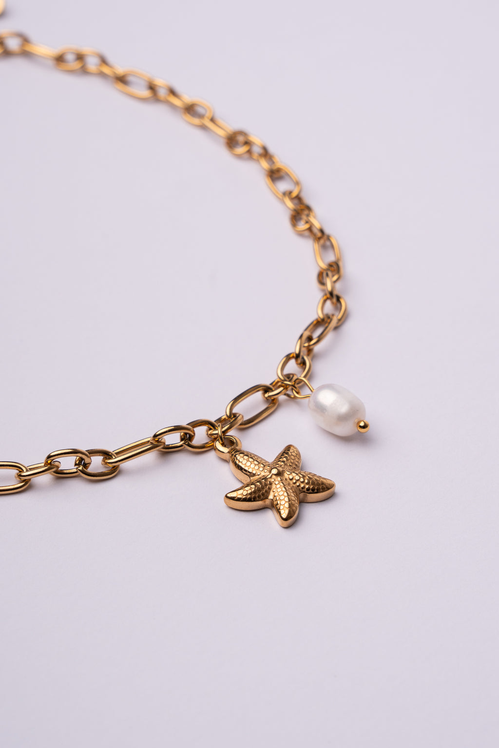 Collar estrella de mar acero oro 18k mujer