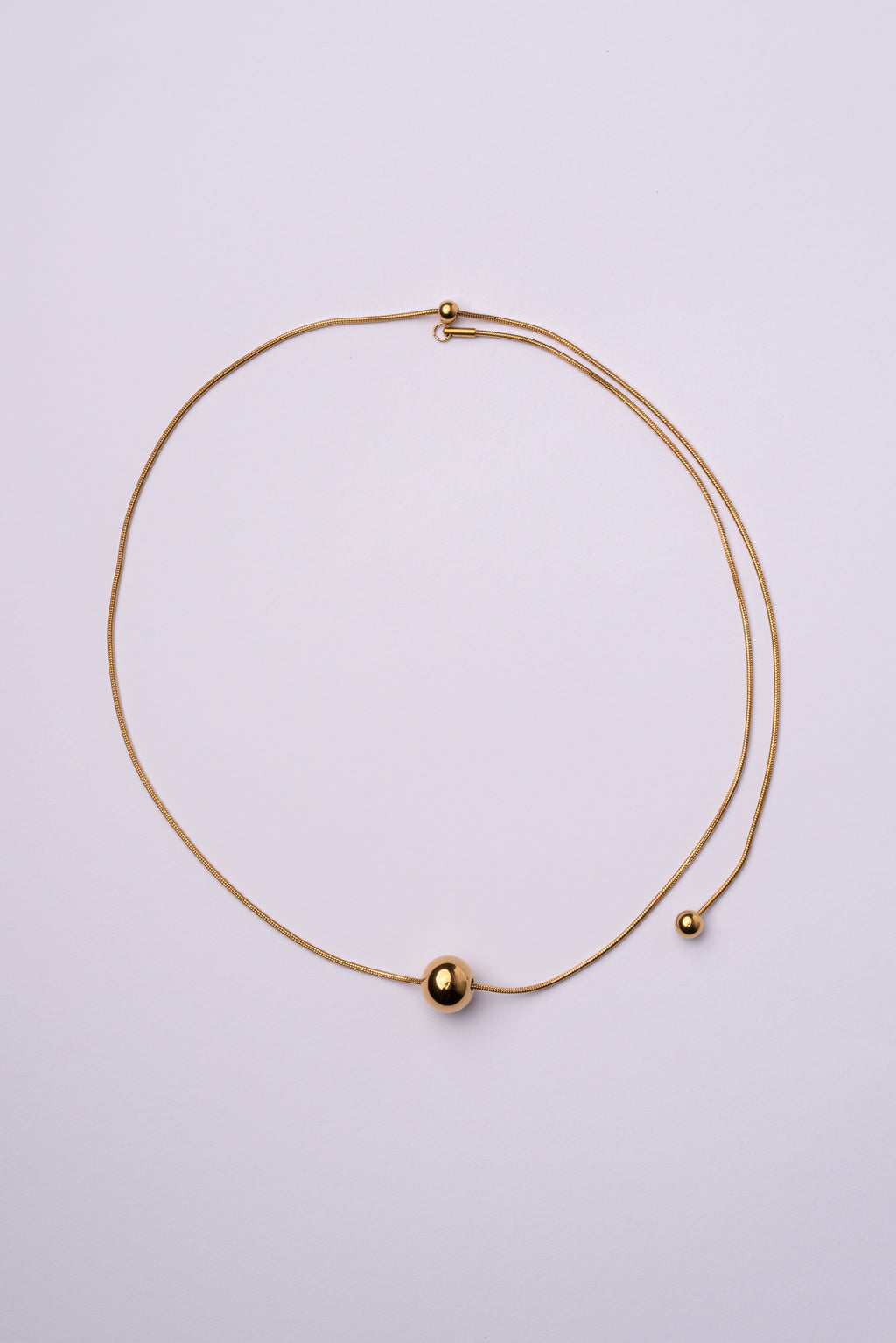 Collar bola espalda acero oro 18k mujer