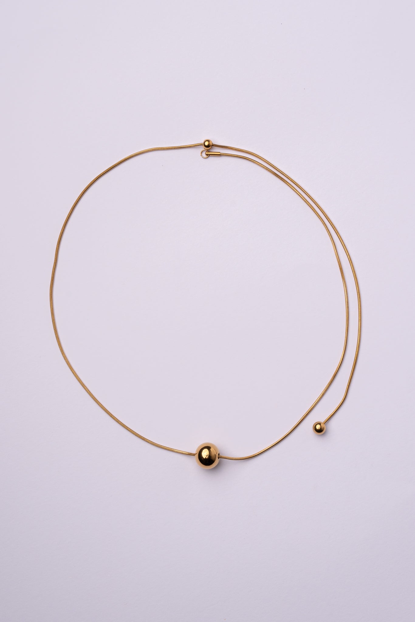 Collar bola espalda acero oro 18k mujer