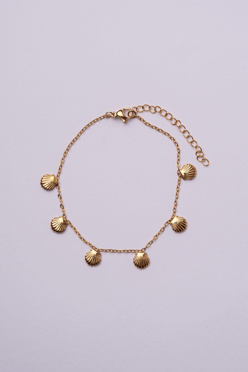 Tobillera conchas acero oro 18K mujer