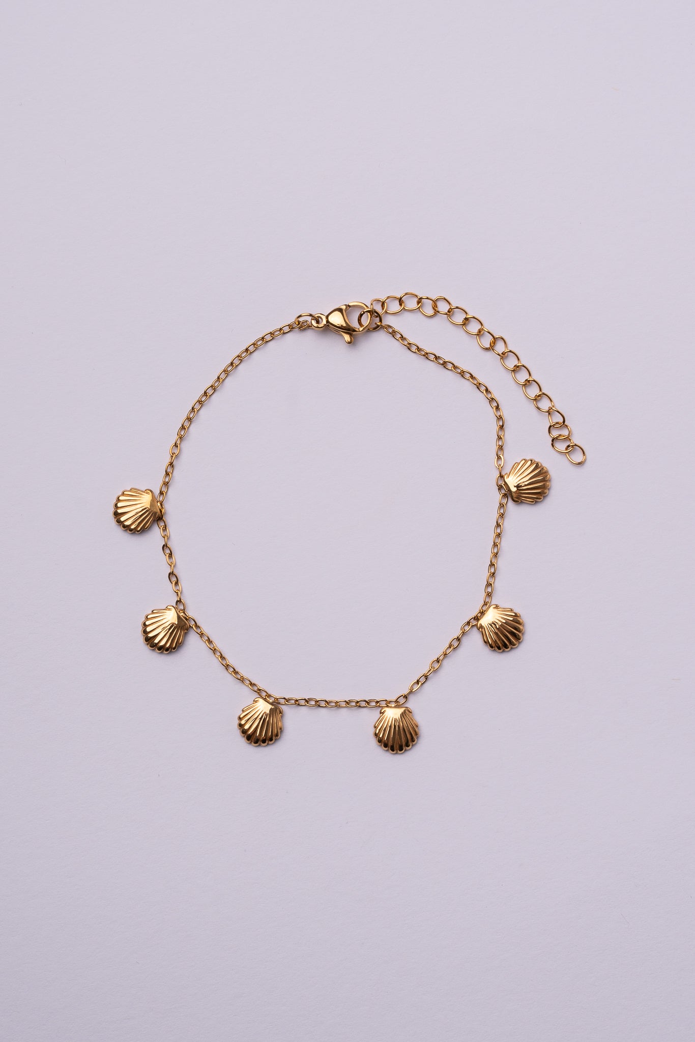 Tobillera conchas acero oro 18K mujer