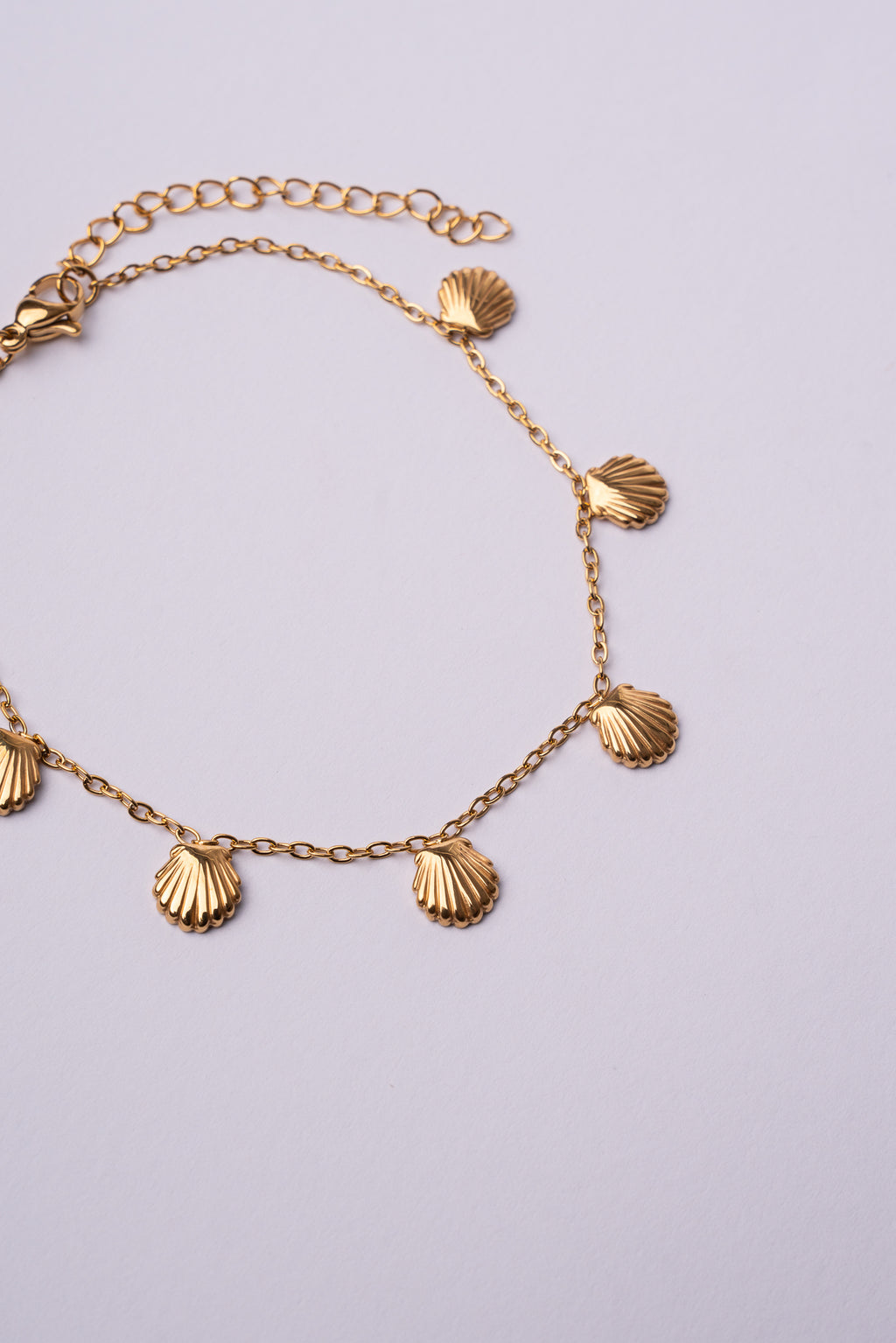 Tobillera conchas acero oro 18K mujer