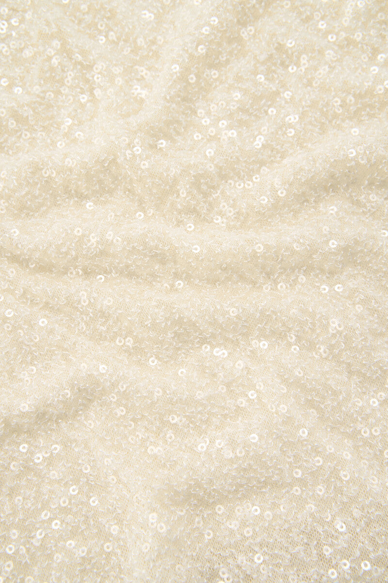 TOP ASIMÉTRICO LENTEJUELAS